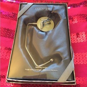 Purse holder / keeps your purse off the floor